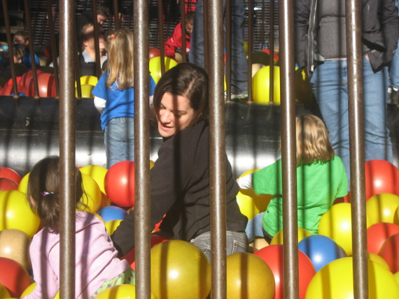 Playing in the ball and balloon cage